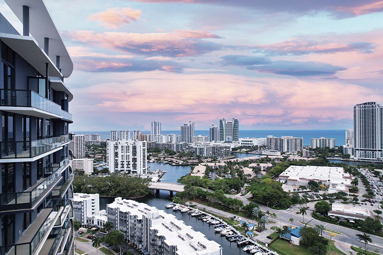 city with ocean views at sunset