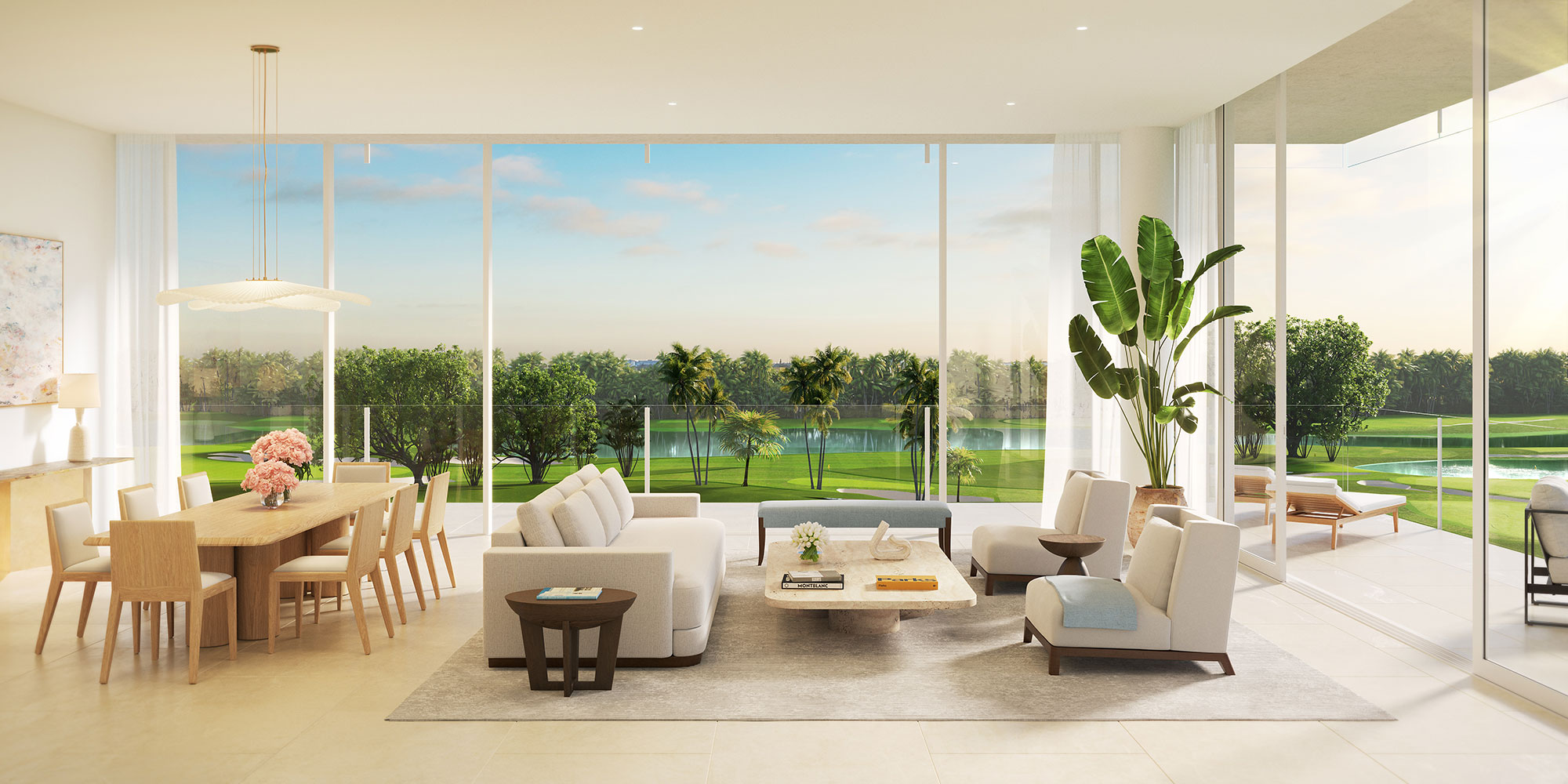 living and dining room space with gold course views